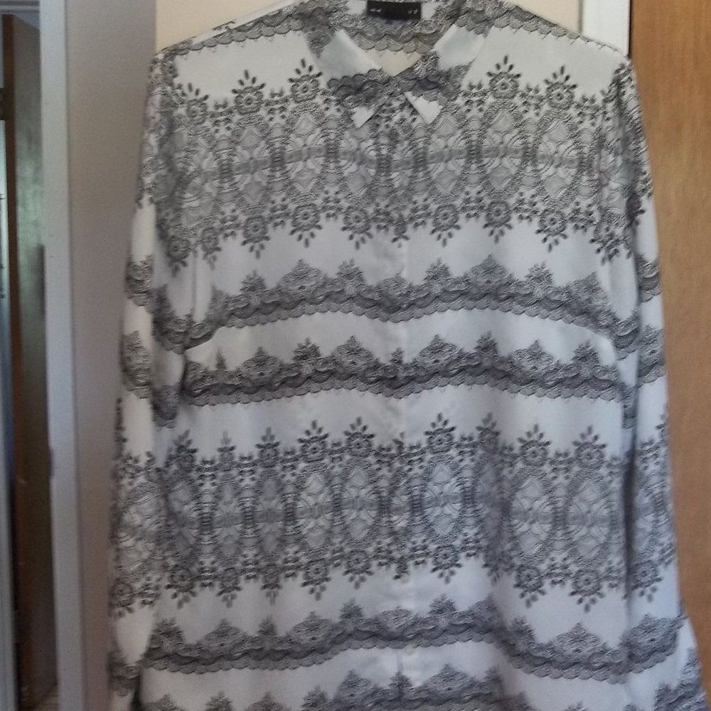 Black and white patterned blouse